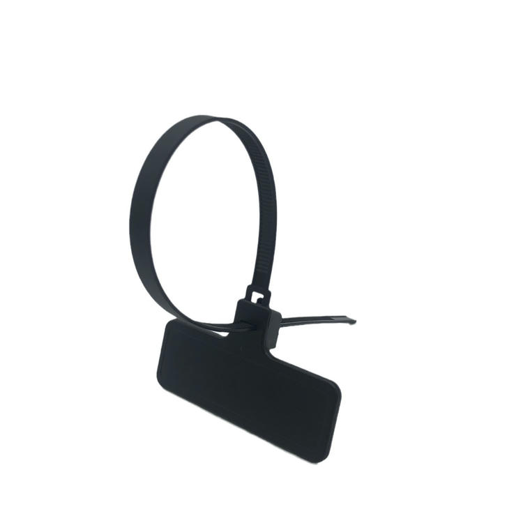 ภาพที่ 2: ภาพนี้แสดงแท็กสาย RFID สำหรับติดตามทรัพย์สินและซีลกันแกะ Z31079-1 โดยเน้นสีดำ และรูปทรงเรขาคณิตที่เห็นชัด.