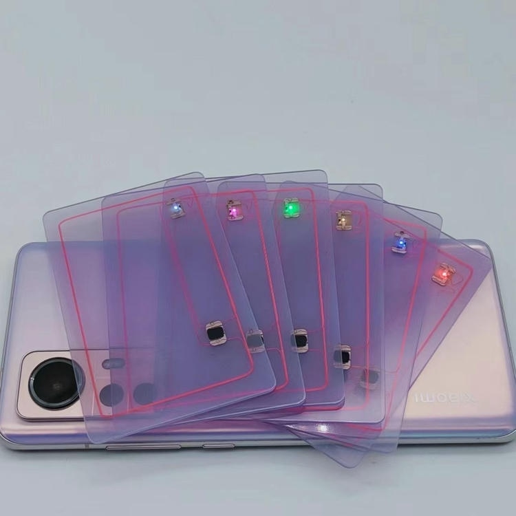 2) ภาพรวมผลิตภัณฑ์หลายชิ้นของนามบัตร NFC LED พร้อมไฟตอบรับเมื่อแตะสำหรับเครือข่าย โดยเน้นไฟแสดงสถานะ LED และการใช้งานร่วมกับสมาร์ตโฟนและแอปมือถือ โดยจัดเรียงให้เปรียบเทียบรายละเอียดได้ชัดเจน สำหรับการจัดการอุปกรณ์อิเล็กทรอนิกส์และทรัพย์สิน IT.