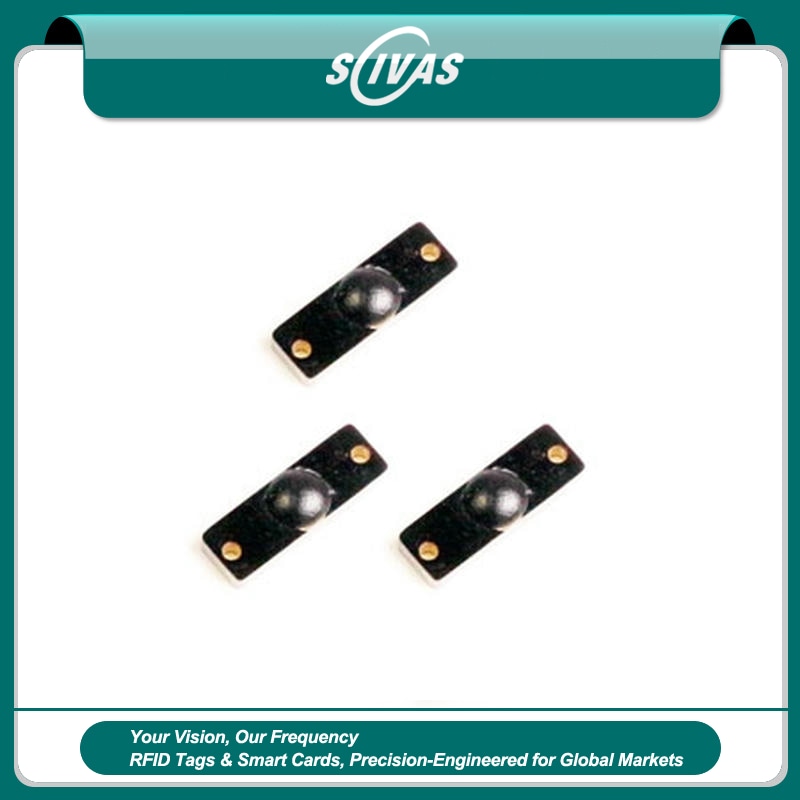 1) ภาพนี้แสดงแท็ก PCB UHF ขนาดเล็กสำหรับติดตามเครื่องมือบนโลหะ P1204-1 RFID IP68 โดยเน้นสีขาว แผงวัสดุ PCB/FR4 โลหะ โครงสร้างกันน้ำและฝุ่น และการทำงานบนพื้นผิวโลหะ สำหรับการตรวจนับและติดตามสินค้าคงคลัง.