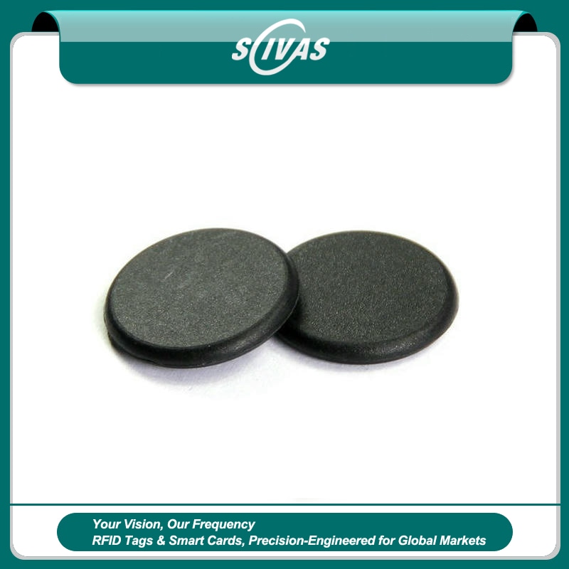 1) ภาพนี้แสดงแท็ก PPS RFID ทนอุณหภูมิสูงสำหรับเครื่องมือและทรัพย์สิน PPSD24-1 โดยเน้นสองชิ้น สีดำ วัสดุ PPS โลหะ และขนาดกะทัดรัด.